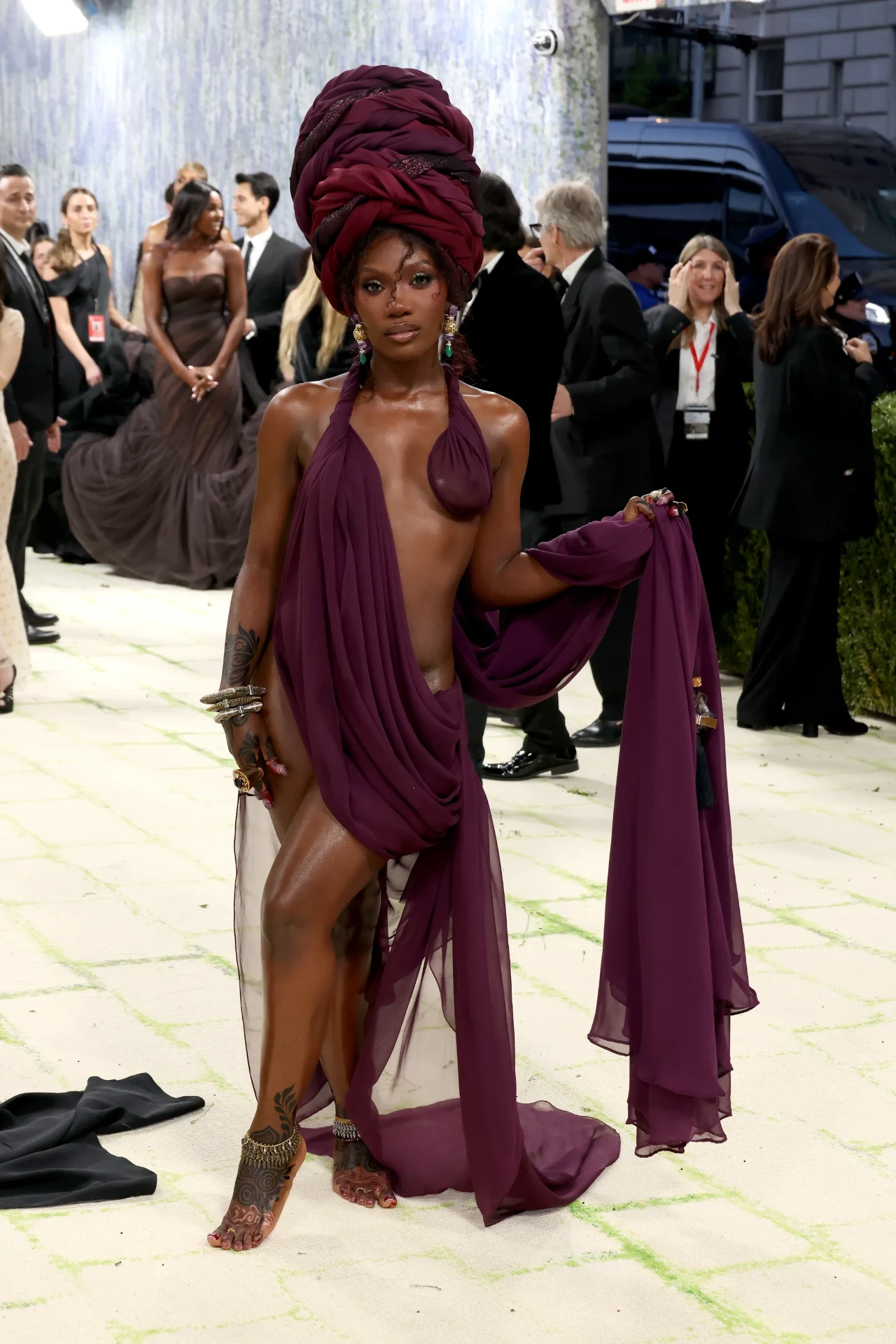 Burgundy draped chiffon with sculpted headwrap